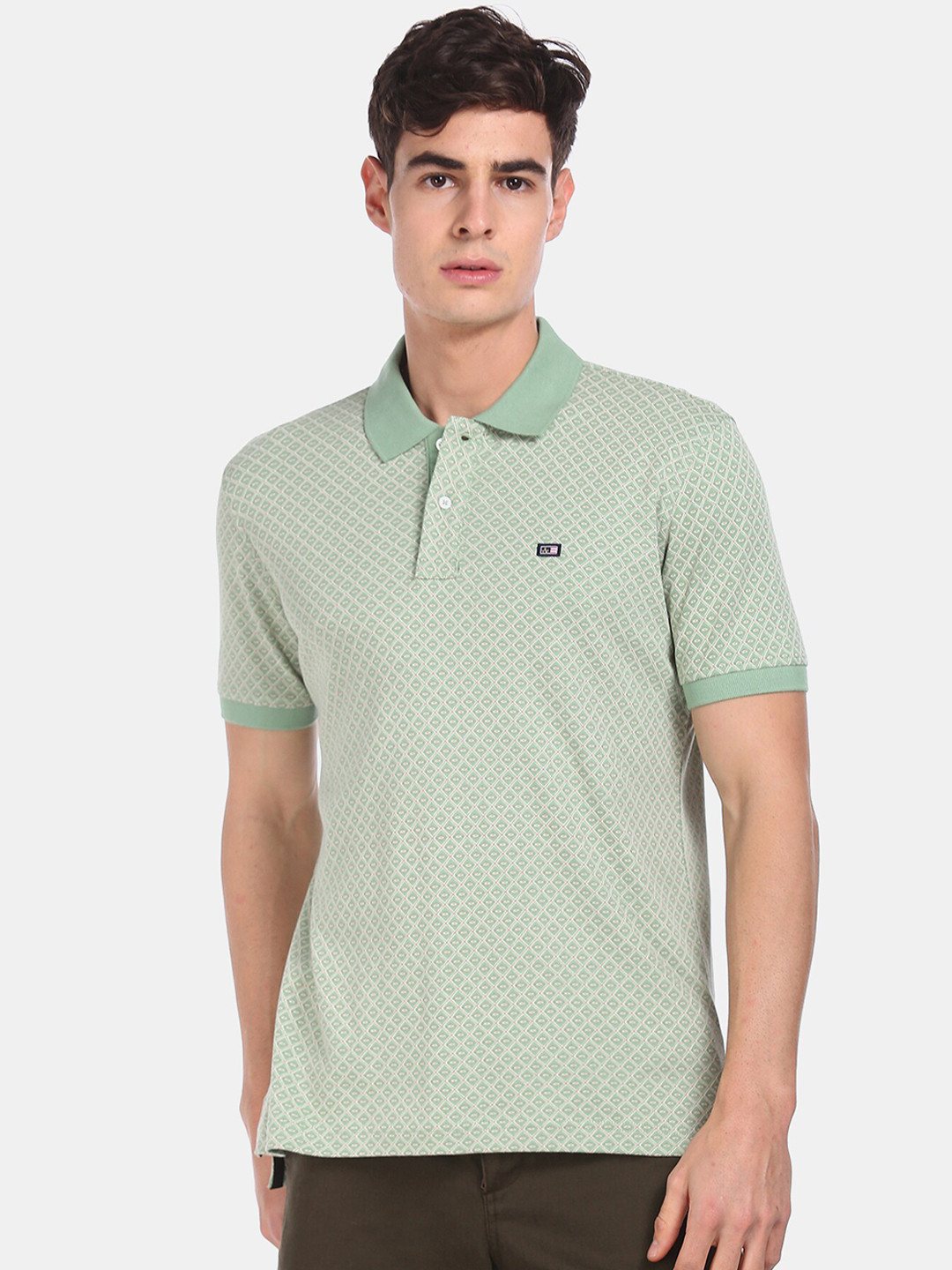 

Arrow Sport Men Green Self Design Polo Collar T-shirt