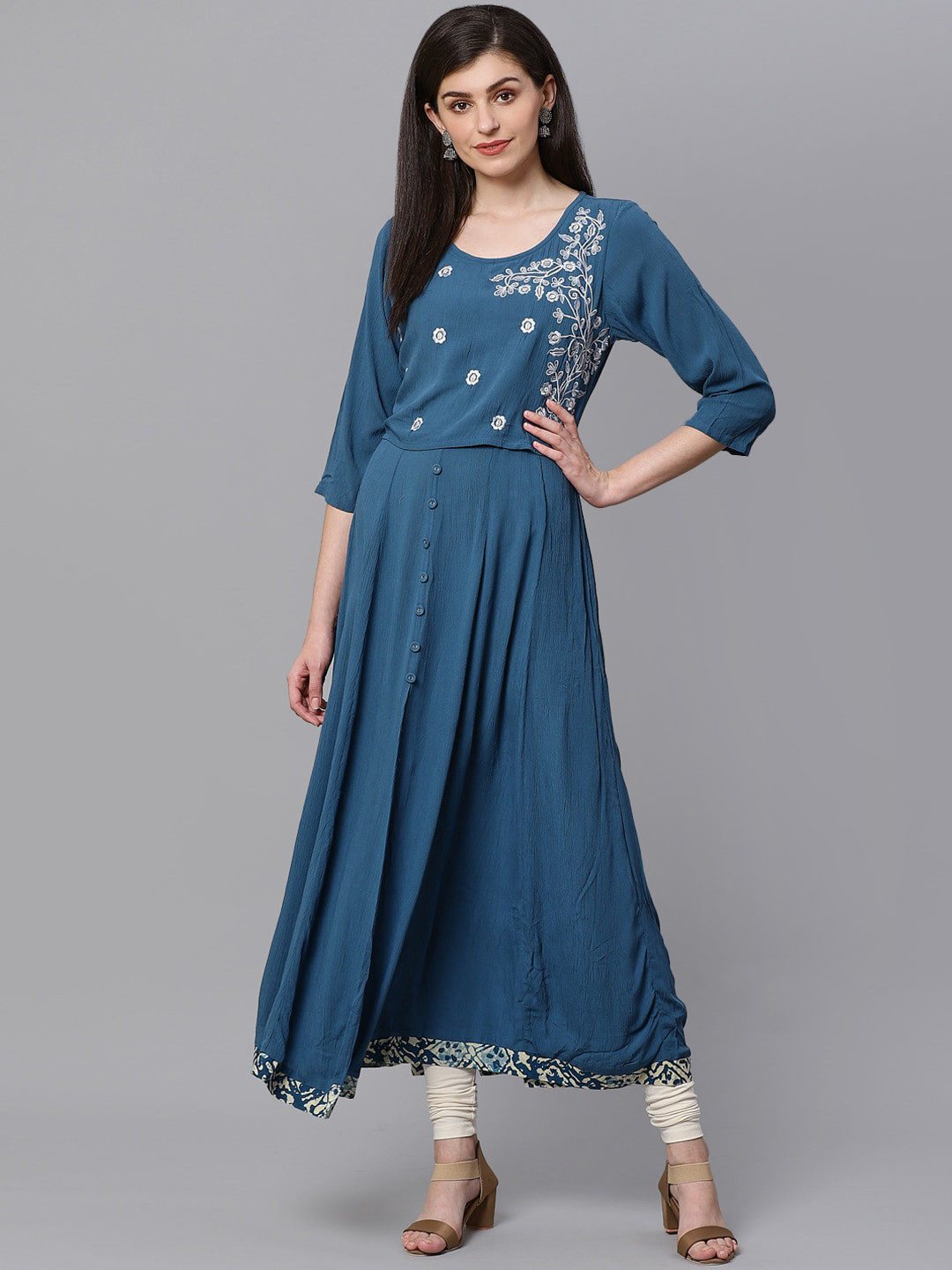 

Kifahari Women Turquoise Blue & White Embroidered Kurta with Churidar