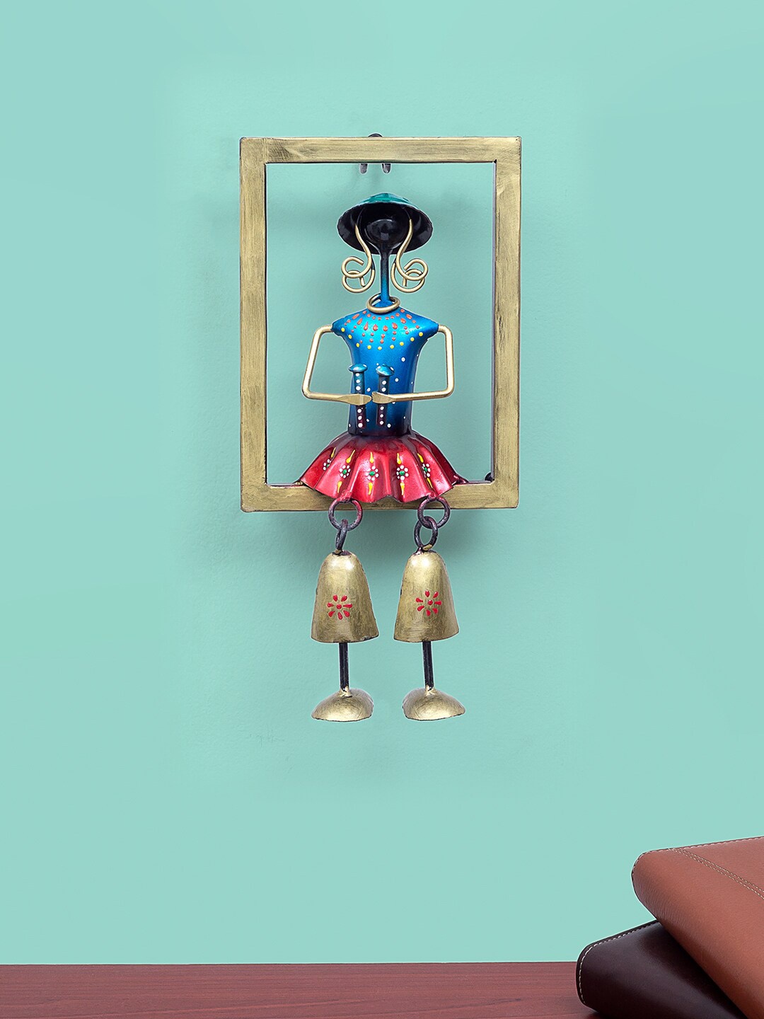 

Golden Peacock Gold-Toned & Blue Handcrafted Doll Playing Maracas Frame Wall Decor