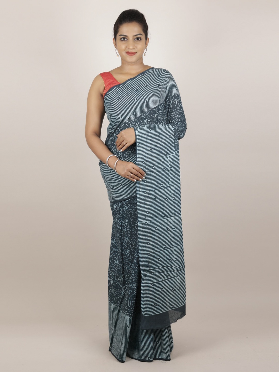 

Pothys Green & Blue Cotton Blend Printed Saree