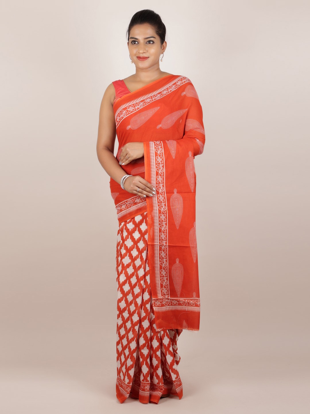 

Pothys Orange Printed Cotton Blend Saree