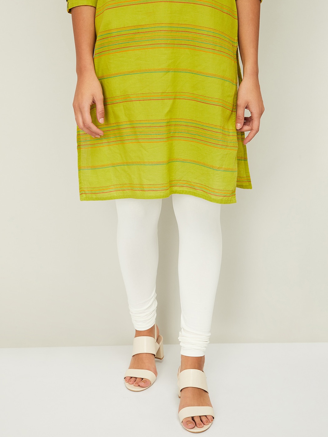 

Melange by Lifestyle Women White Solid Cotton Churidar
