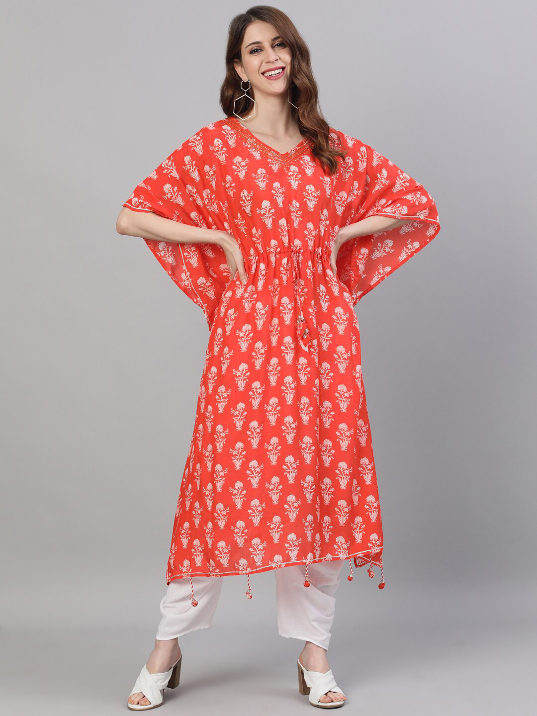 

Ishin Women Orange Floral Embroidered Flared Sleeves Kaftan Kurta
