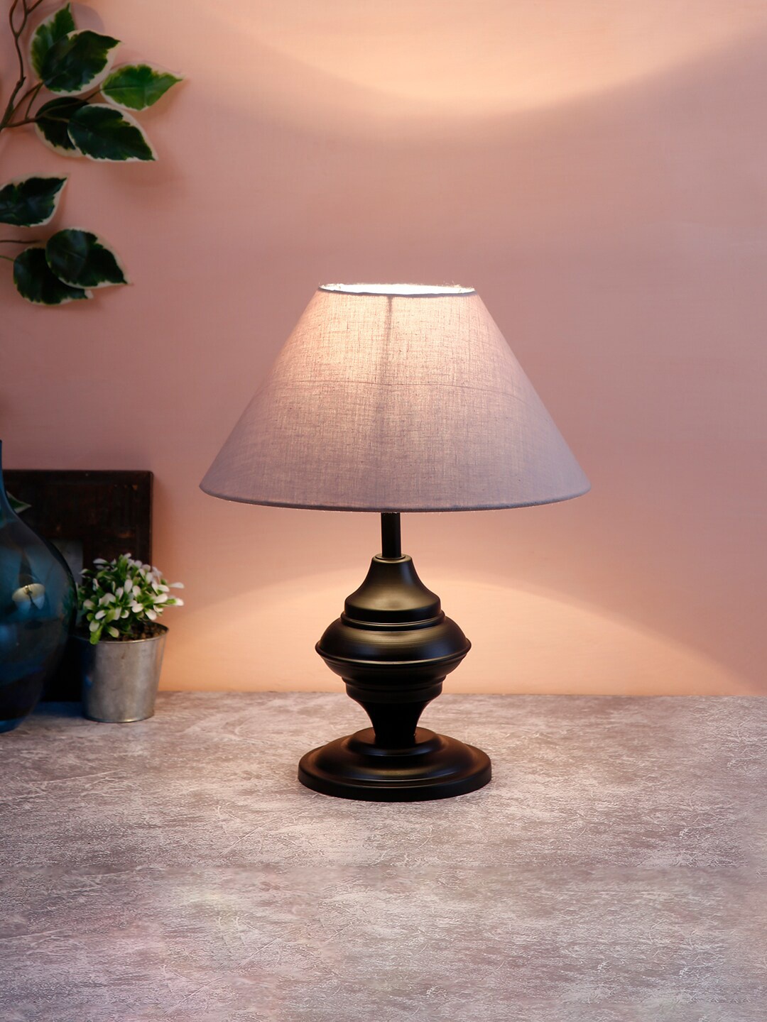 

Devansh Beige & Black Solid Frustum Table Lamp