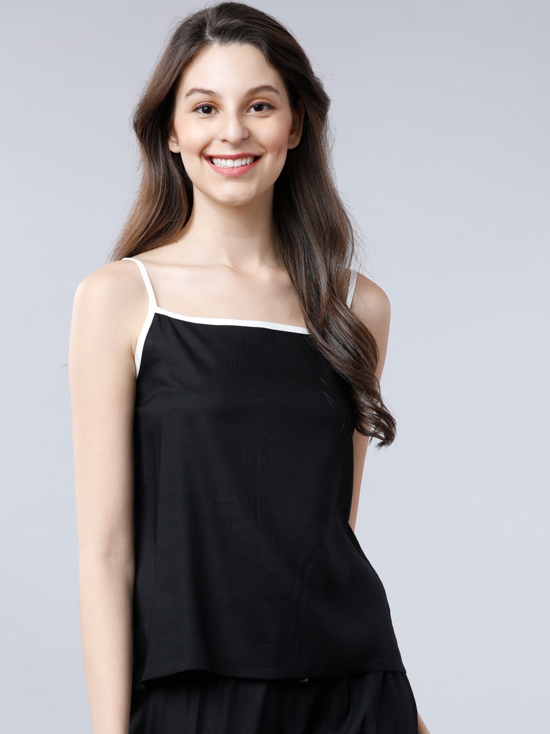 

Tokyo Talkies Women Black Solid Night Suit