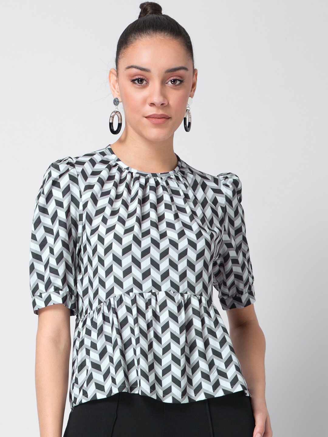 

FabAlley Women Black Printed Crepe Peplum Top
