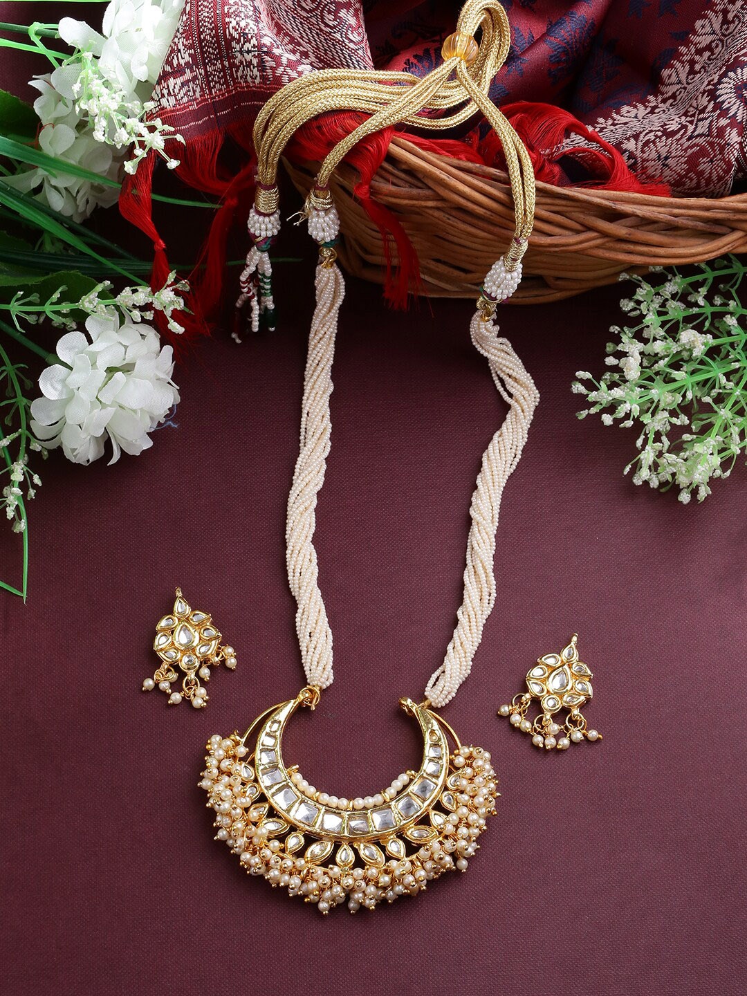 

Shoshaa Women Gold-Plated Off White Kundan-Studded Beaded Handcrafted Jewellery Set