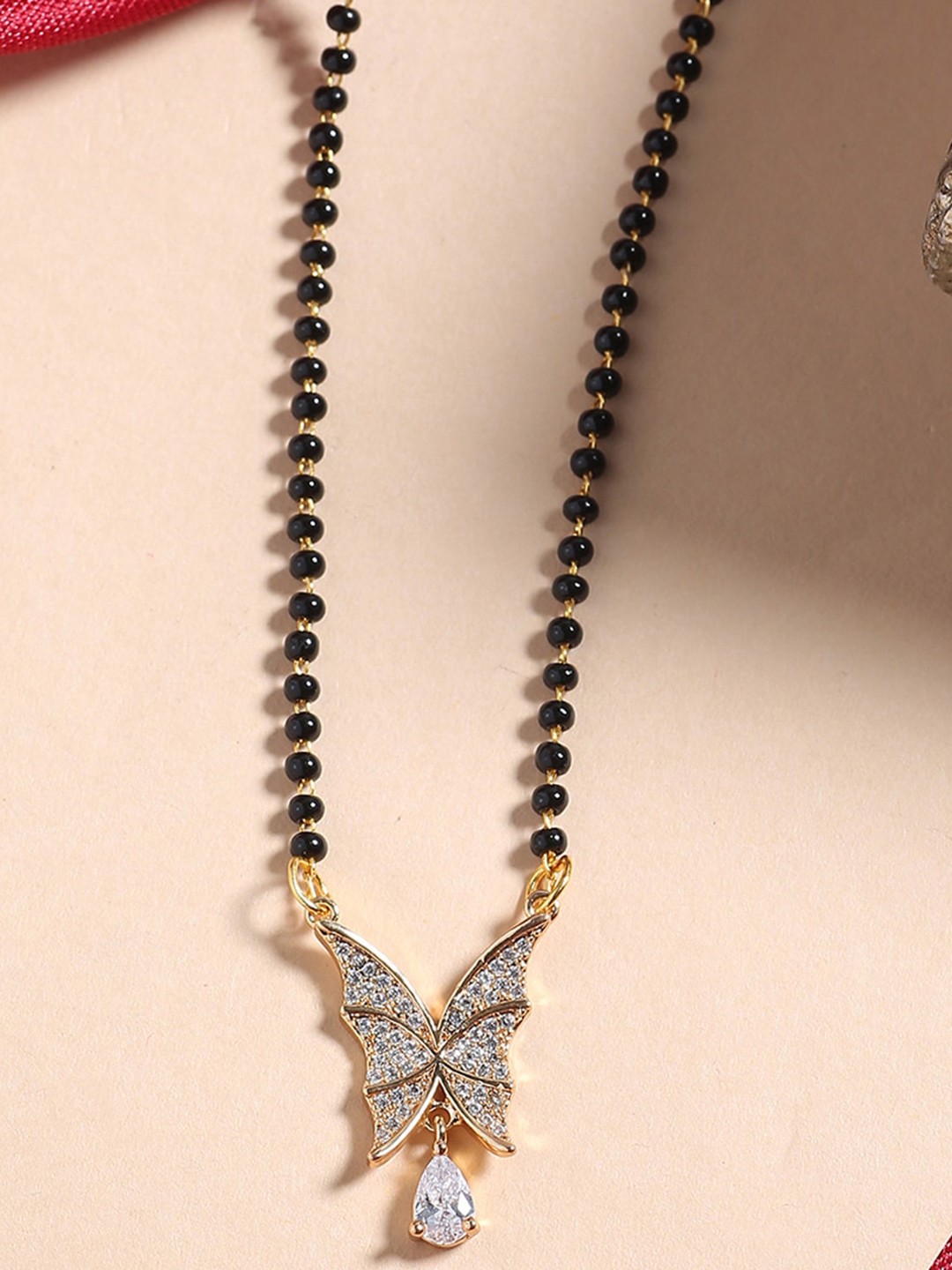 

Shoshaa Gold-Plated Black & White Stone-Studded & Beaded Mangalsutra