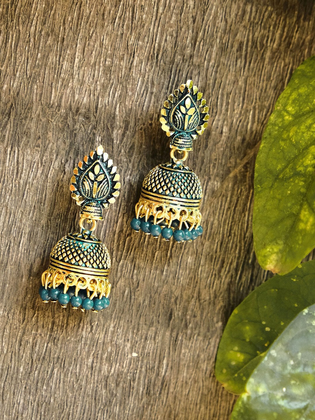 

Crunchy Fashion Green Gold-Plated Dome Shaped Jhumkas