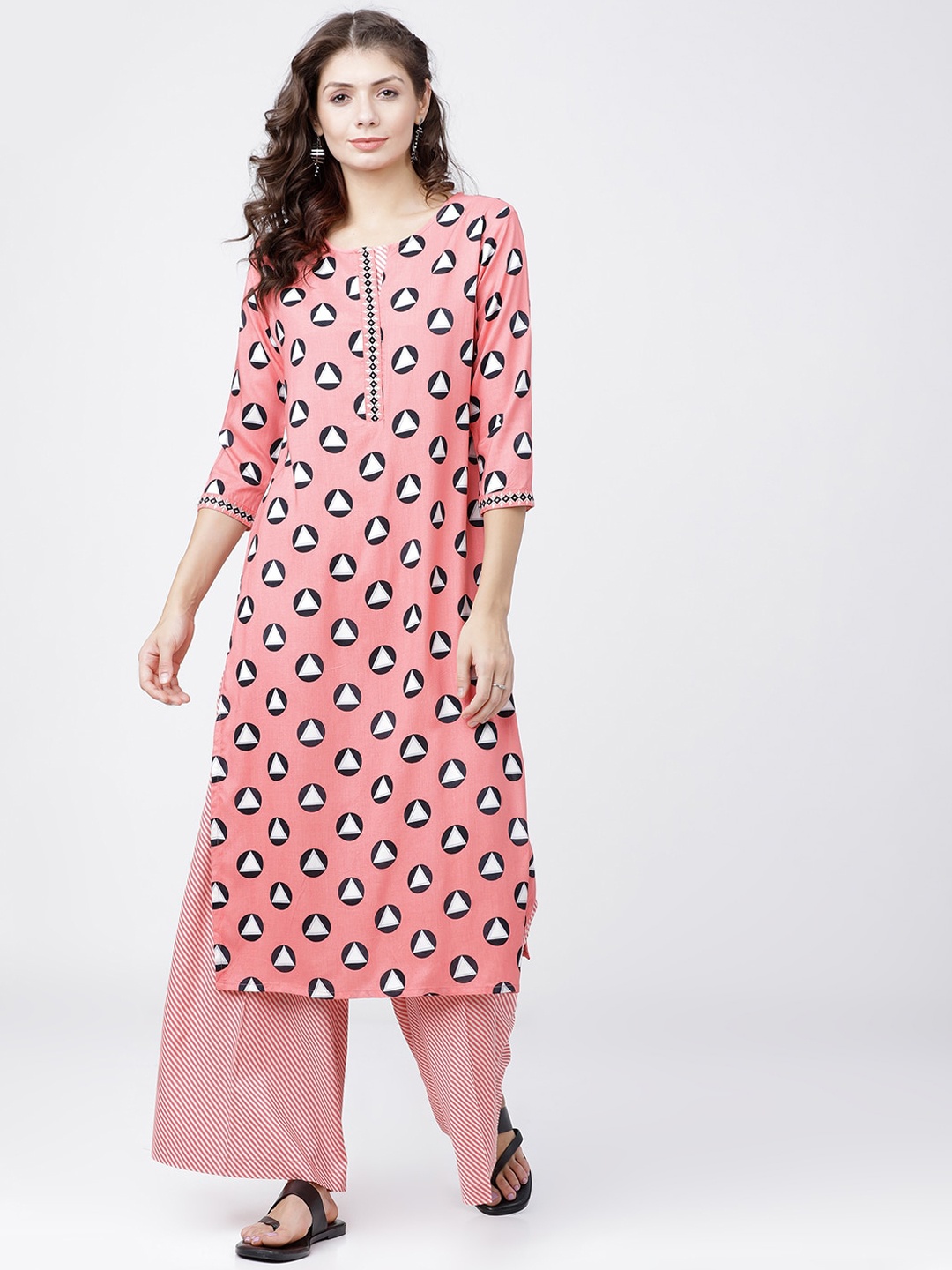 

Vishudh Women Coral Pink & Black Printed Kurta with Palazzos