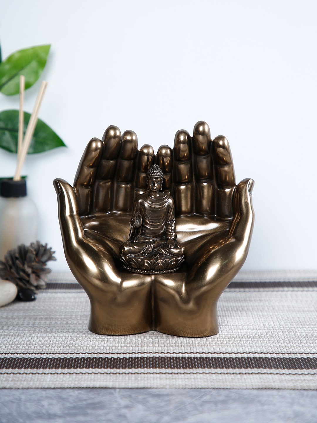 

CraftVatika Gold-Toned Palm Buddha Idol Showpiece