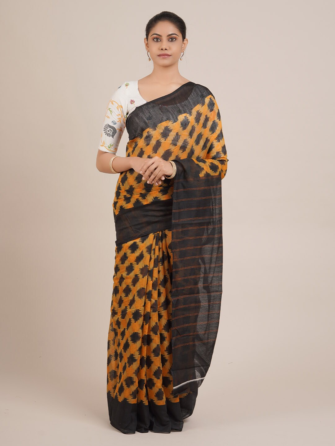 

Pothys Mustard Yellow & Black Linen Blend Printed Saree