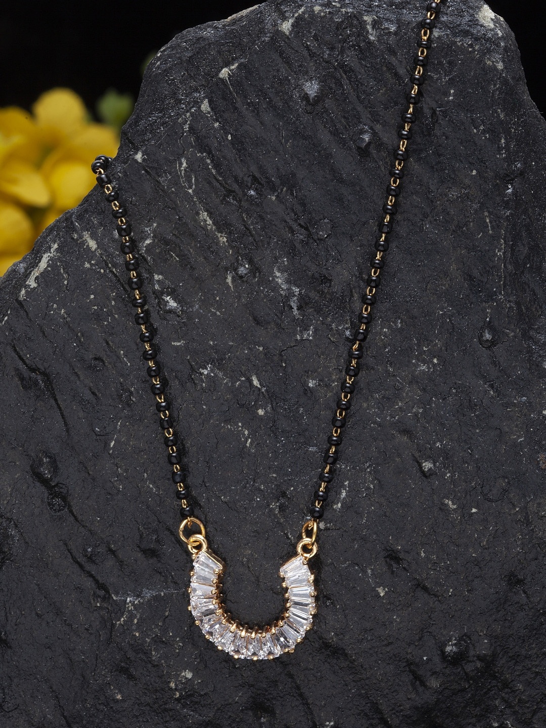 

ANIKAS CREATION Gold-Plated Black Beaded & White AD-Studded Mangalsutra
