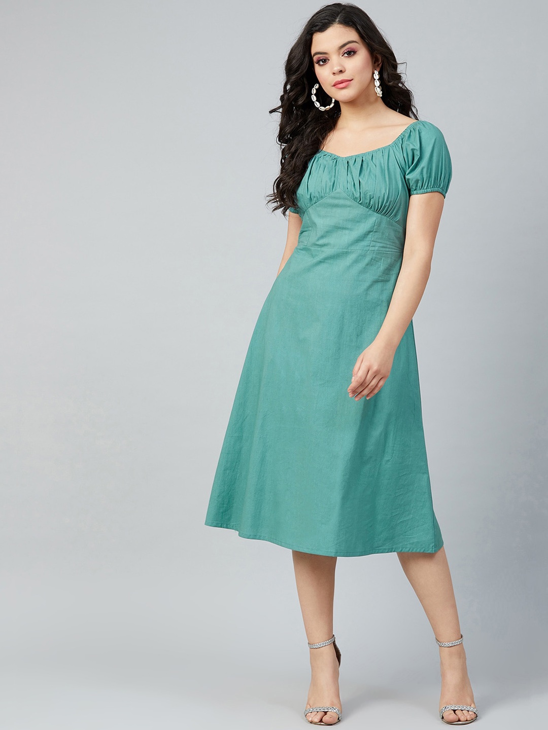 

Athena Women Teal Solid Cotton A-Line Dress