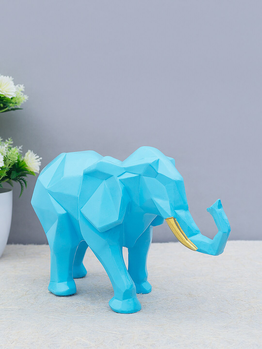 

Golden Peacock Blue & Gold-Toned Polyresin Elephant Showpiece