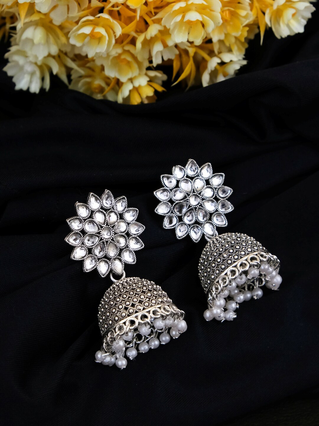 

Crunchy Fashion White & Silver Plated Jhumkas