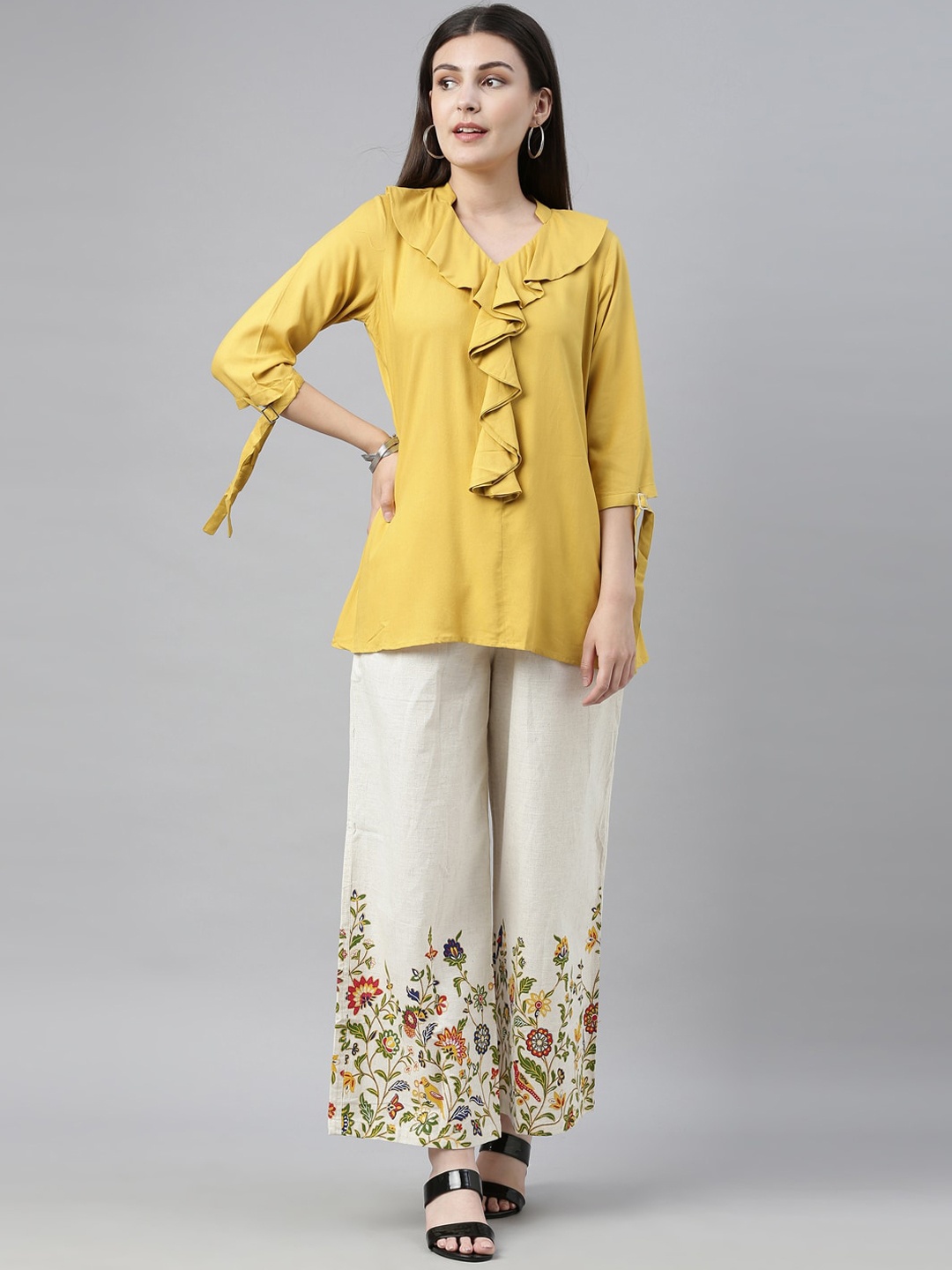 

Neerus Women Mustard Solid Kurti with Palazzos