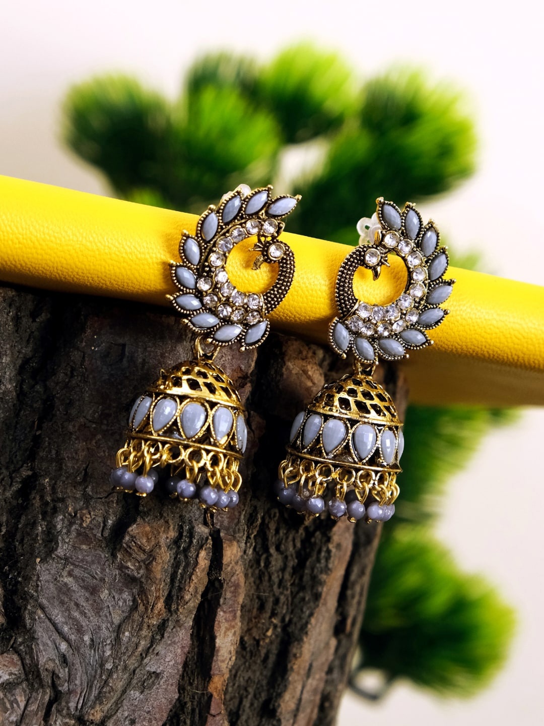 

Crunchy Fashion Grey Gold-Plated Antique Stone Studded & Beaded Peacock Shaped Jhumkas