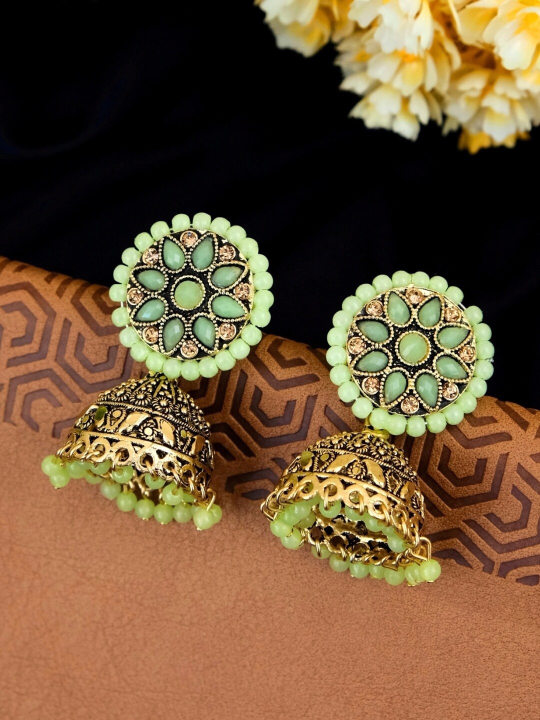

Crunchy Fashion Gold-Plated & Green Stone Studded Antique Dome Shaped Jhumkas