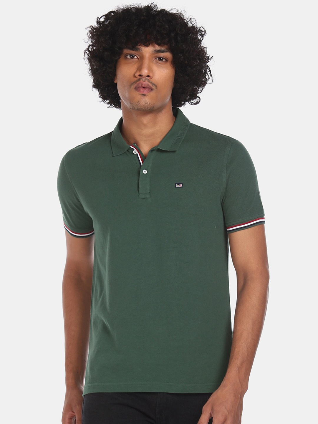 

Arrow Sport Men Green Solid Polo Collar T-shirt