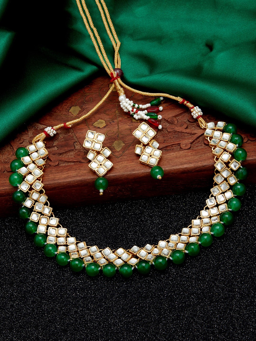 

Sukkhi Gold-Plated White & Green Kundan-Studded & Pearl Beaded Jewellery Set
