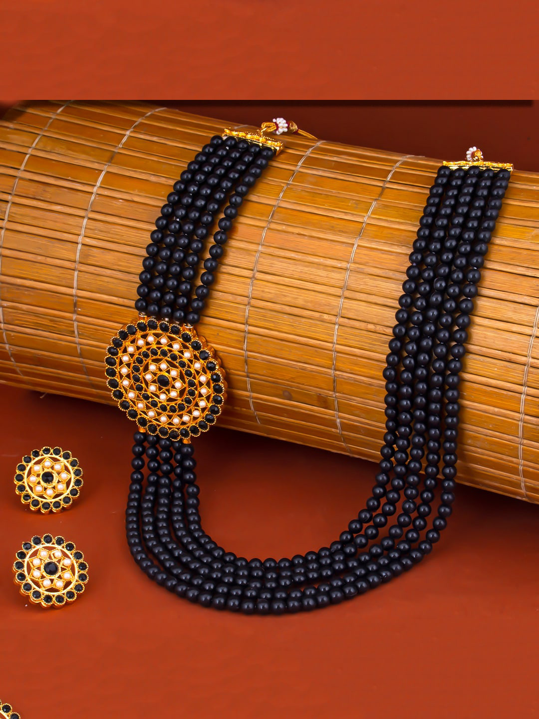 

Sukkhi Gold-Plated Black & White Pearl Beaded Long Haram Jewellery Set