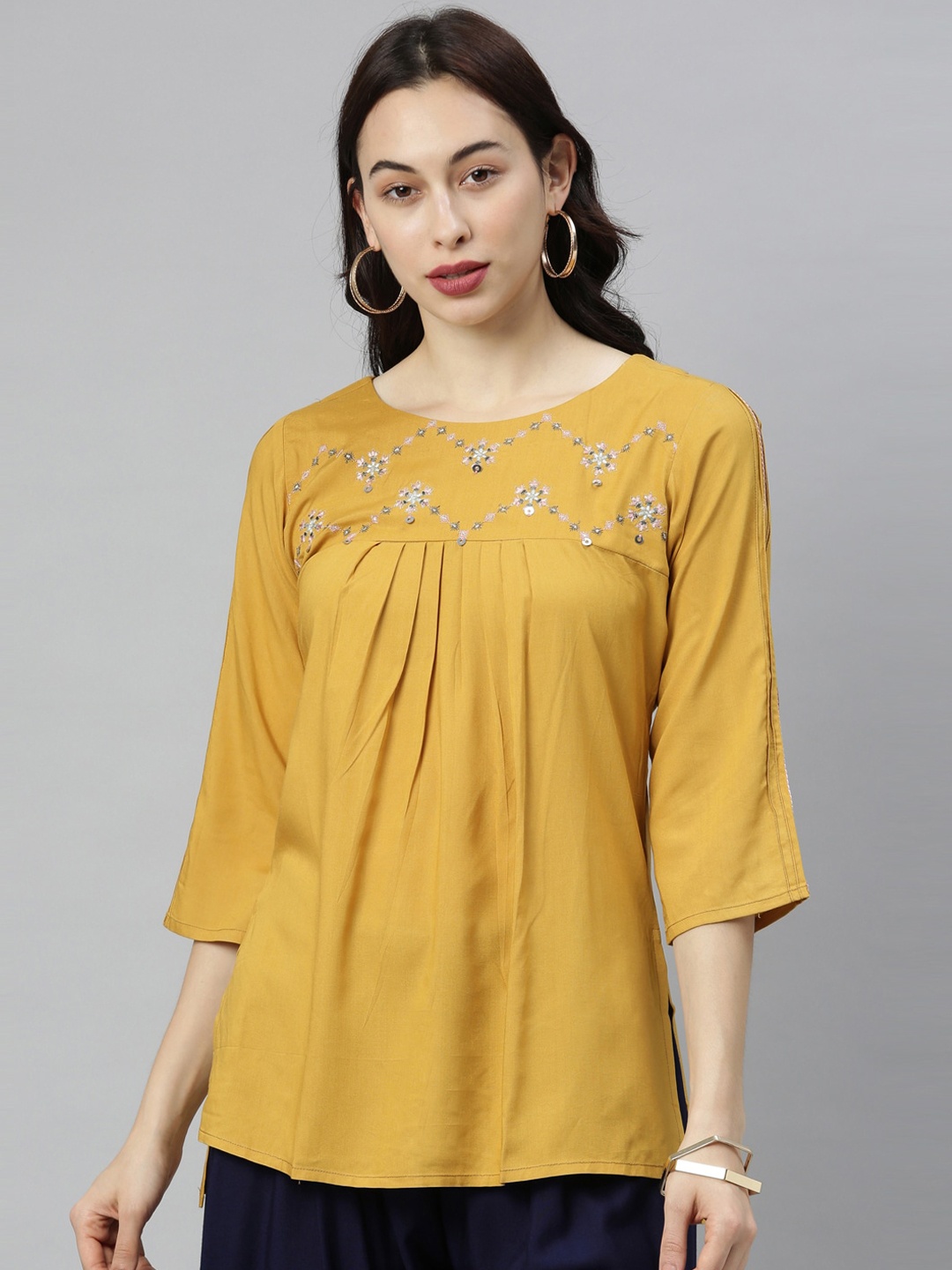 

Neerus Women Mustard Brown Embroidered Kurti