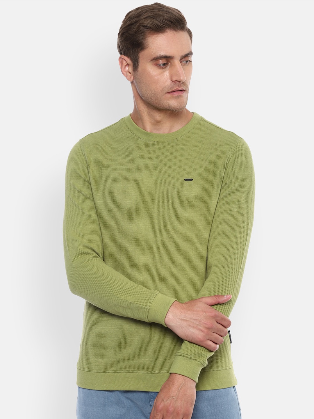 

Van Heusen Sport Men Green Solid Sweatshirt