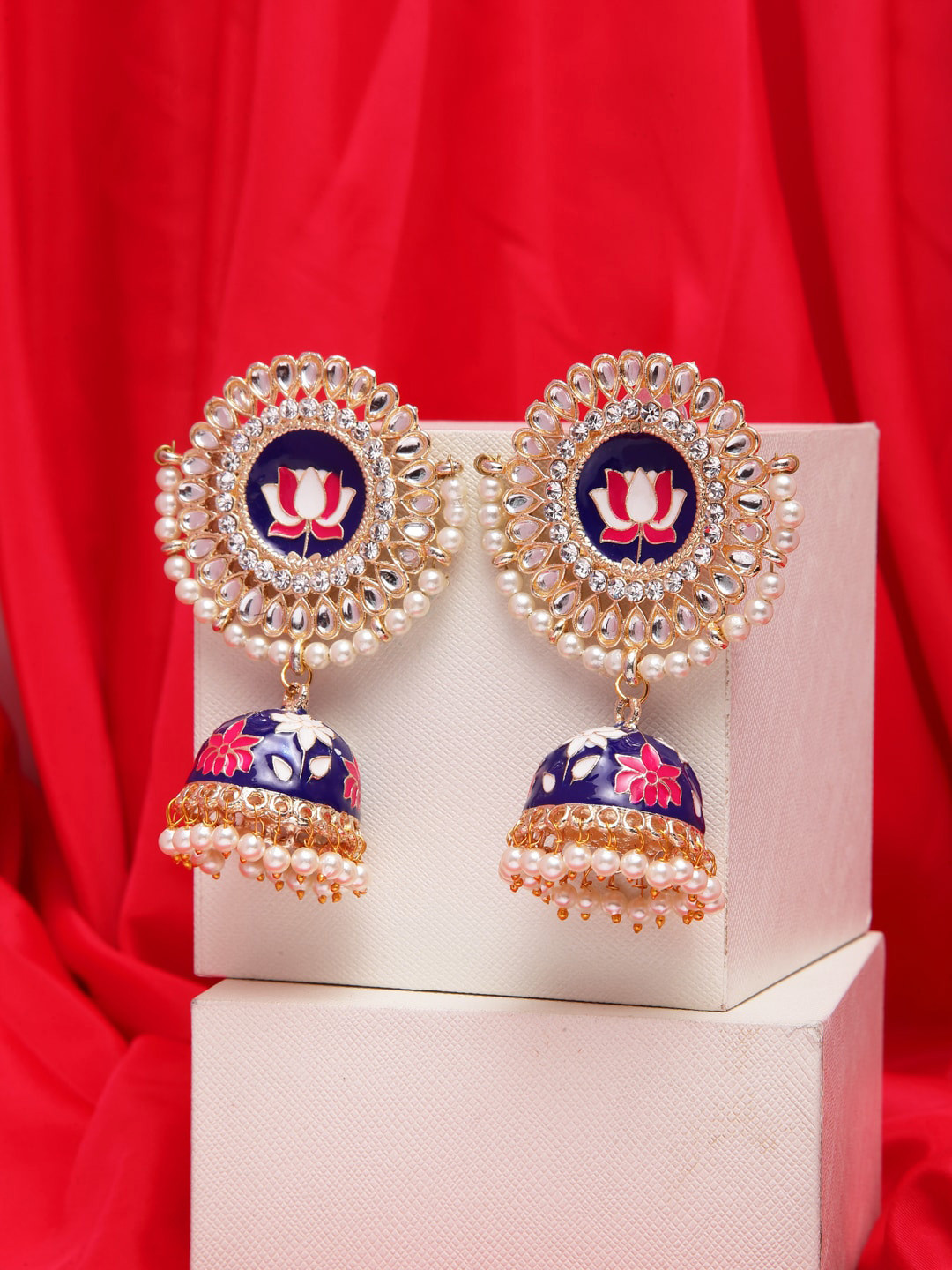 

Shining Diva Navy Blue & White Dome Shaped Jhumkas