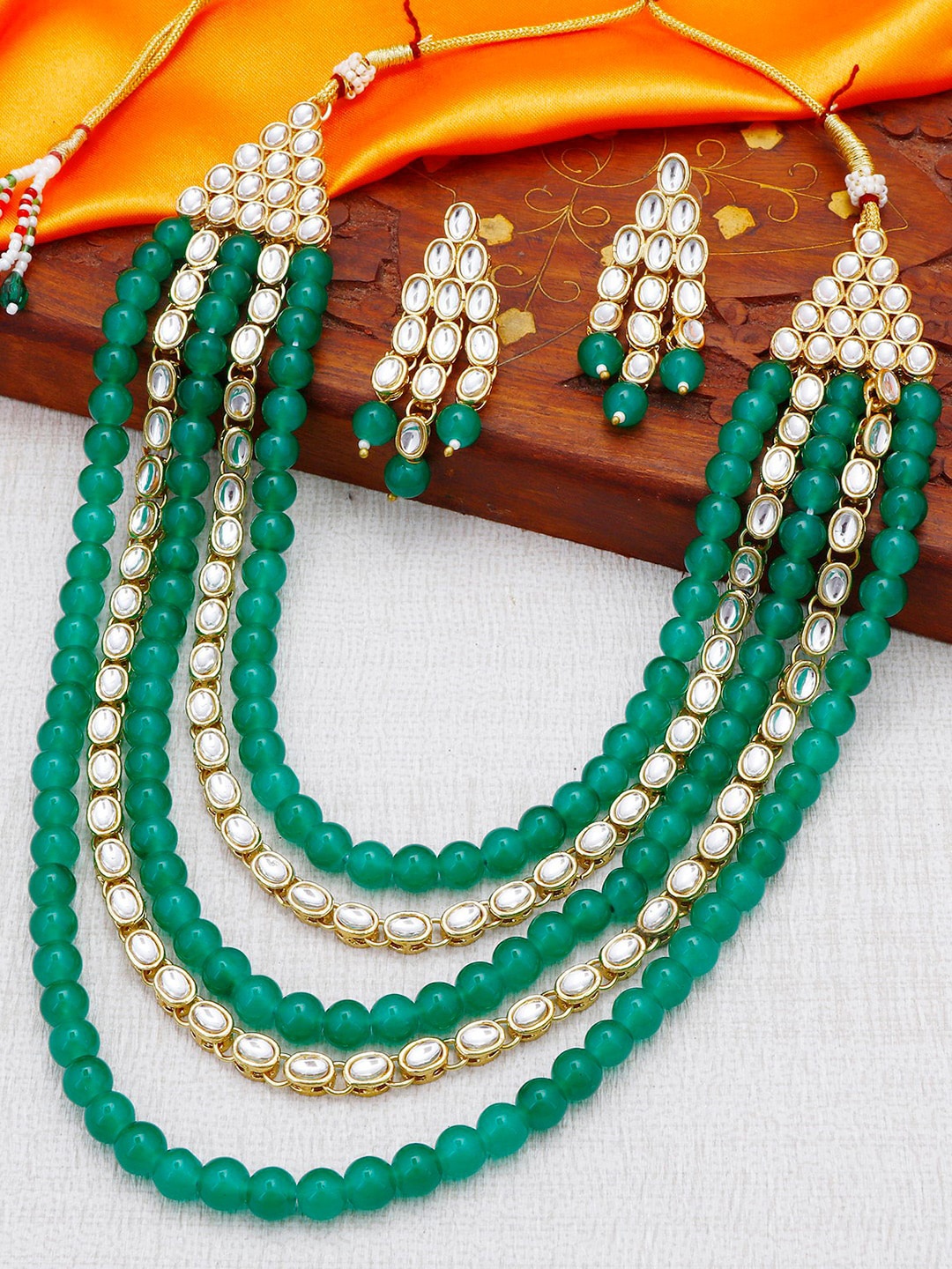 Sukkhi Gold-Plated Green & White Stone-Studded & Beaded Jewellery Set