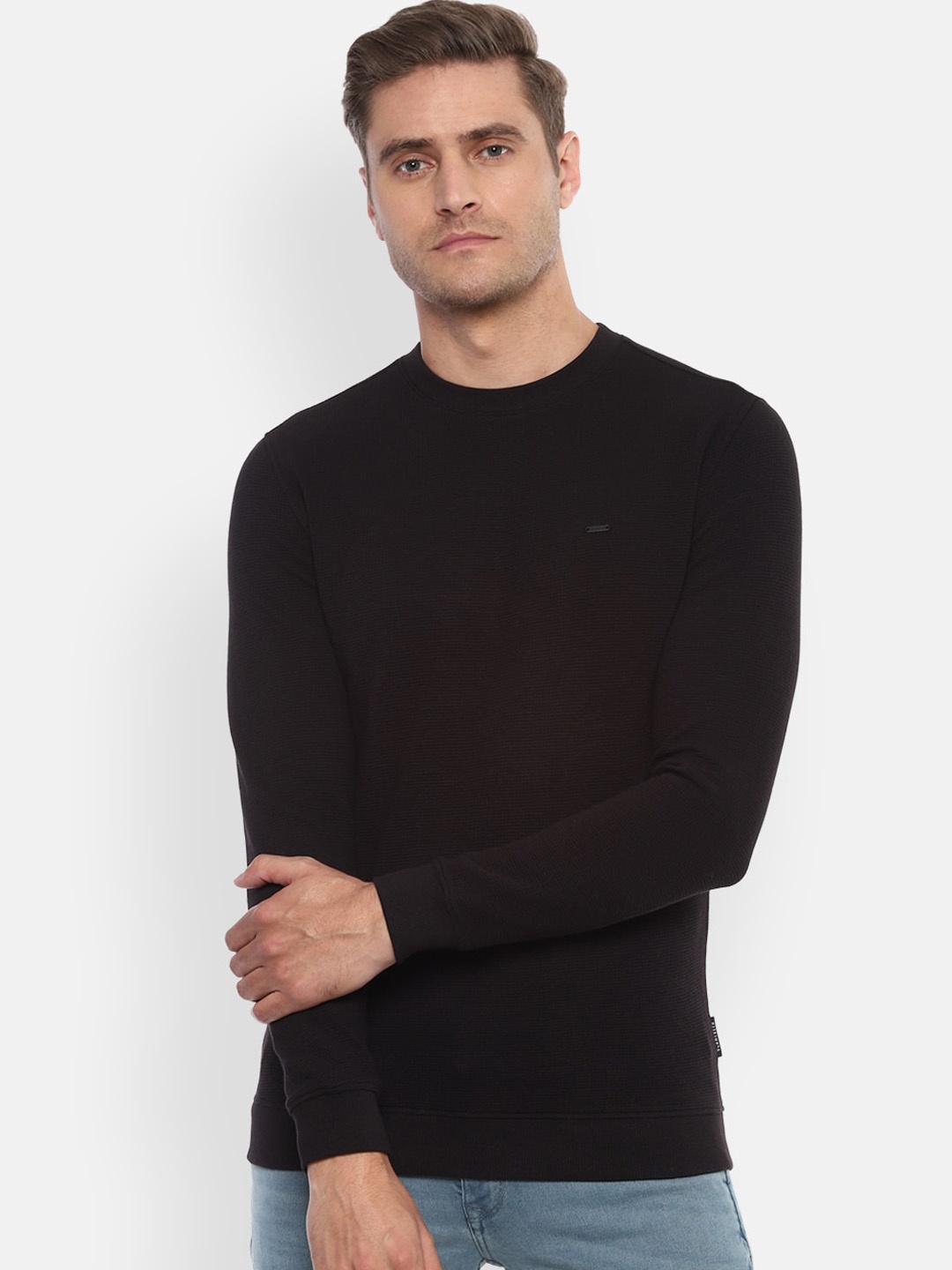 

Van Heusen Sport Men Black Solid Sweatshirt