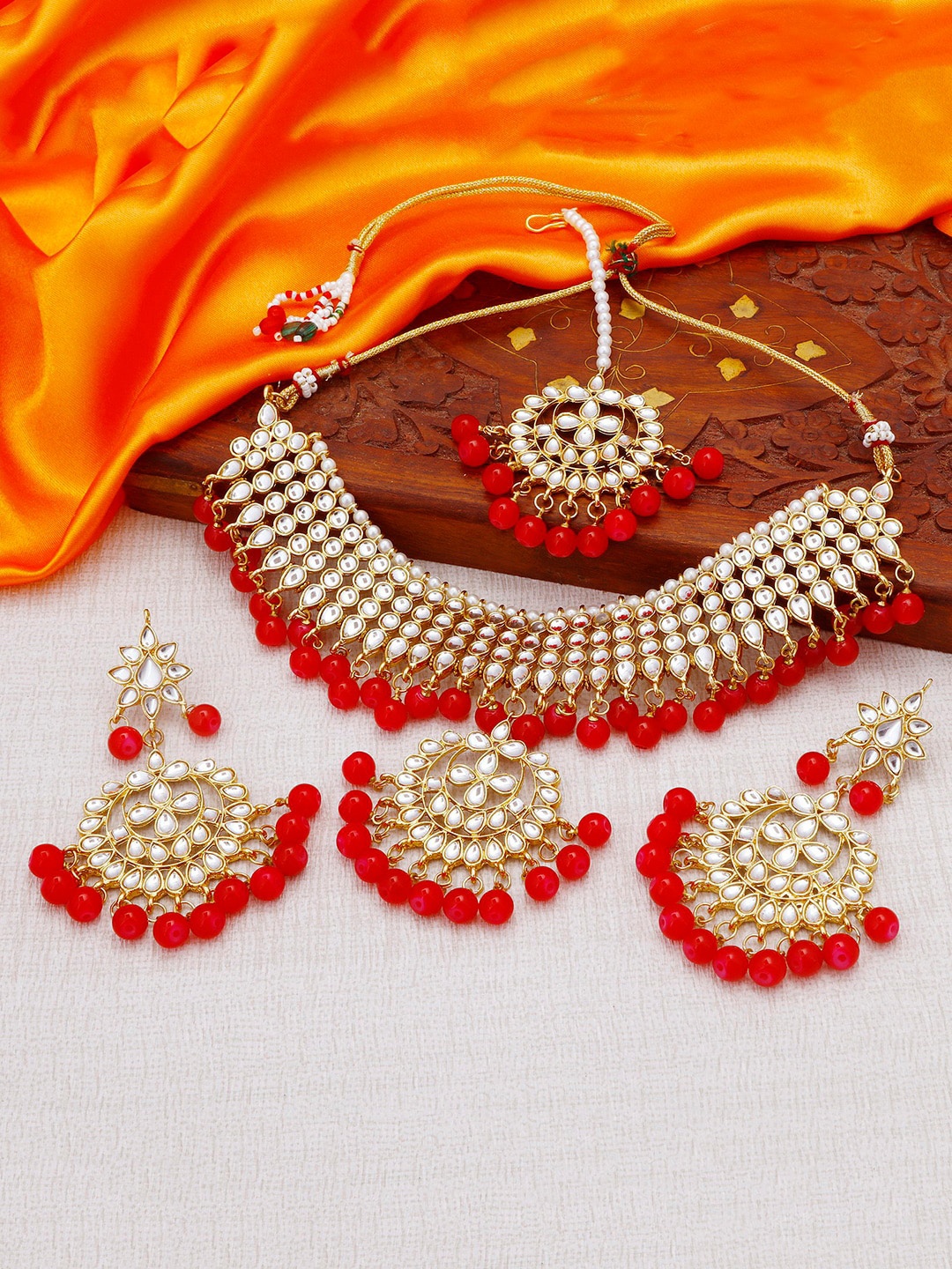 

Sukkhi Gold-Plated Red & White Kundan-Studded & Beaded Jewellery Set