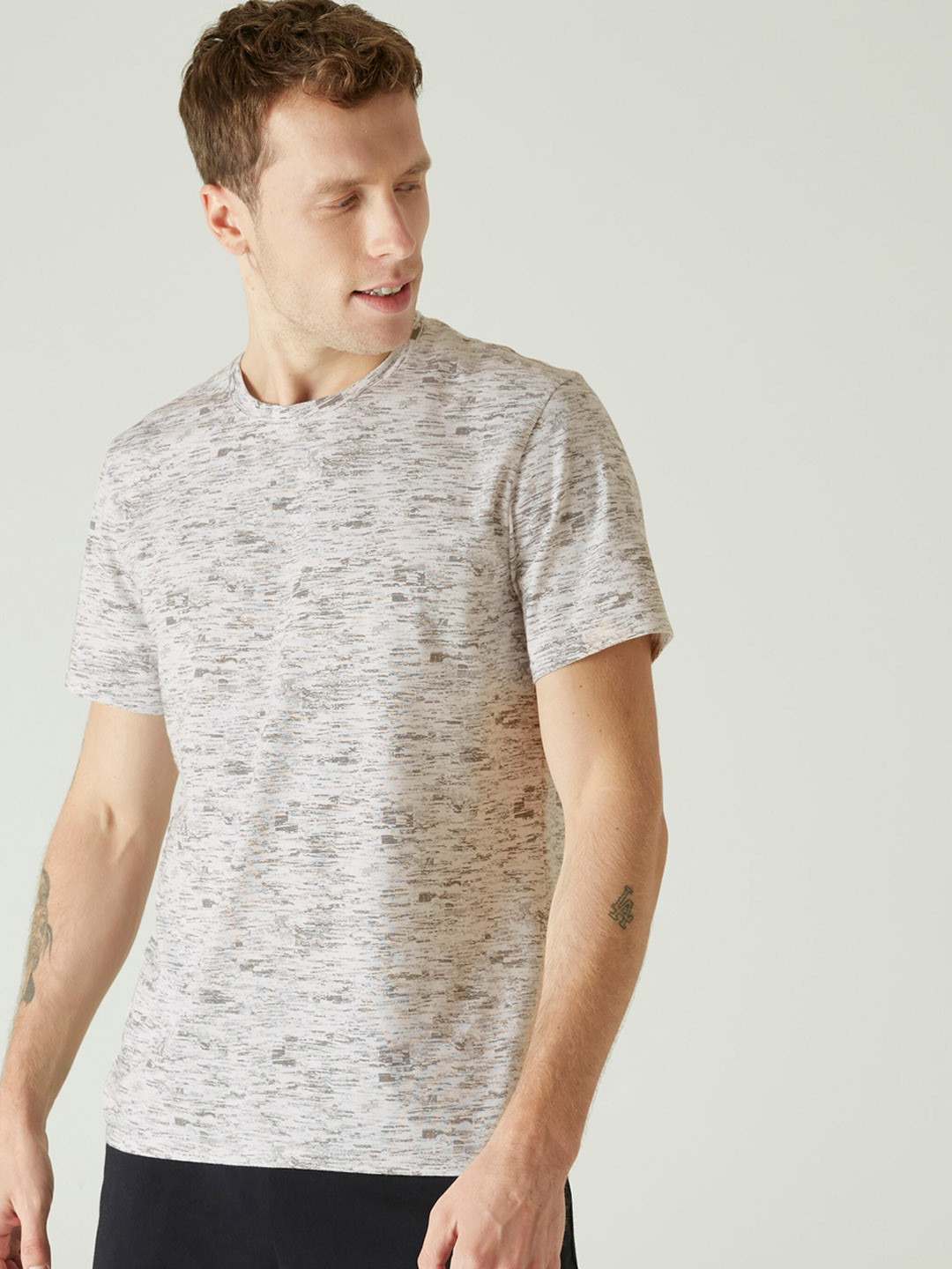 

NYAMBA By Decathlon Men Off-White & Grey Abstract Print Pilates T-shirt
