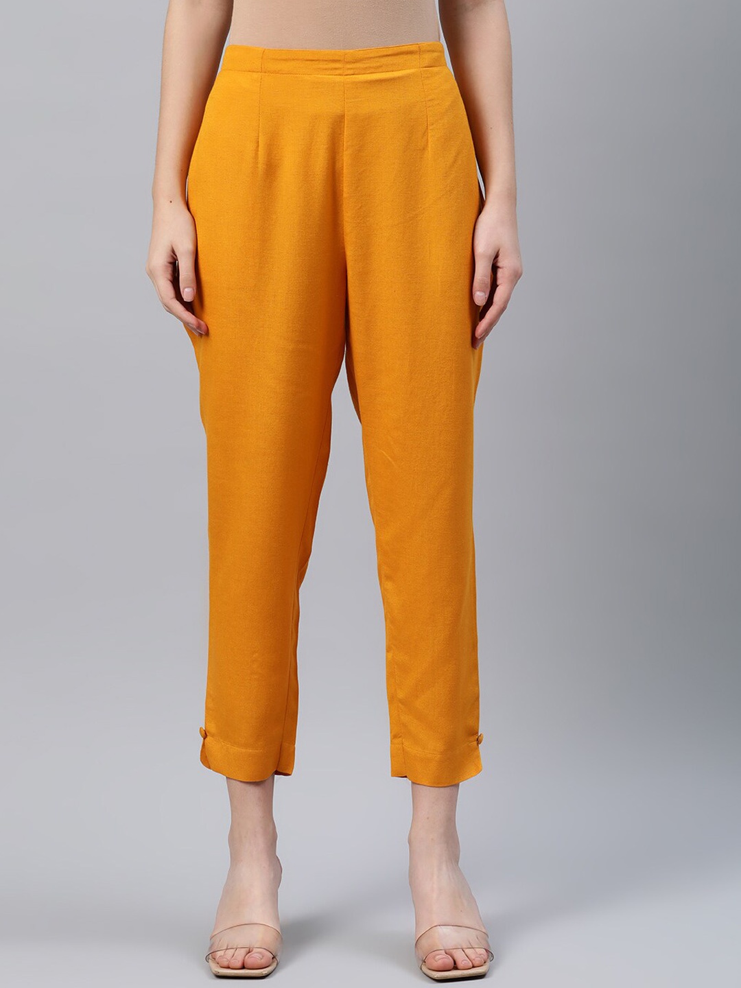 

Libas Women Yellow Regular Fit Solid Cropped Trousers