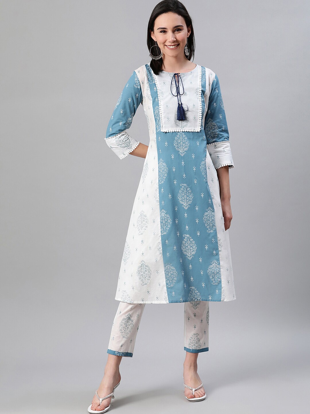 

ZIYAA Women White & Blue Ethnic Motifs Screen Print Cotton Tie-up Neck A-Line Kurta