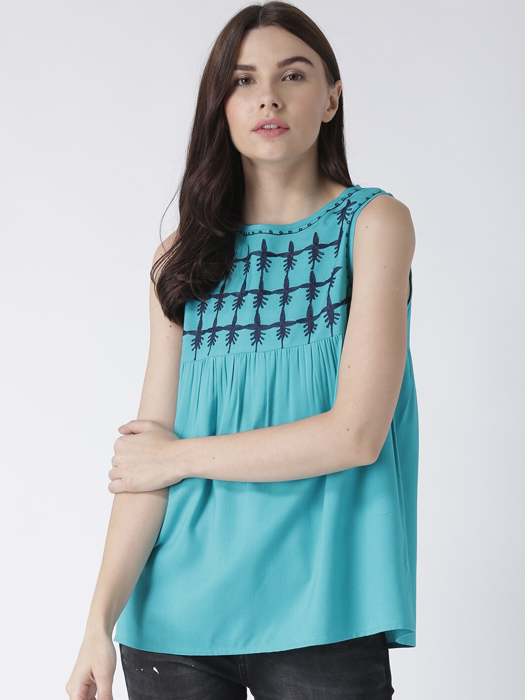 

The Vanca Turquoise Blue Geometric Embroidered A-Line Top
