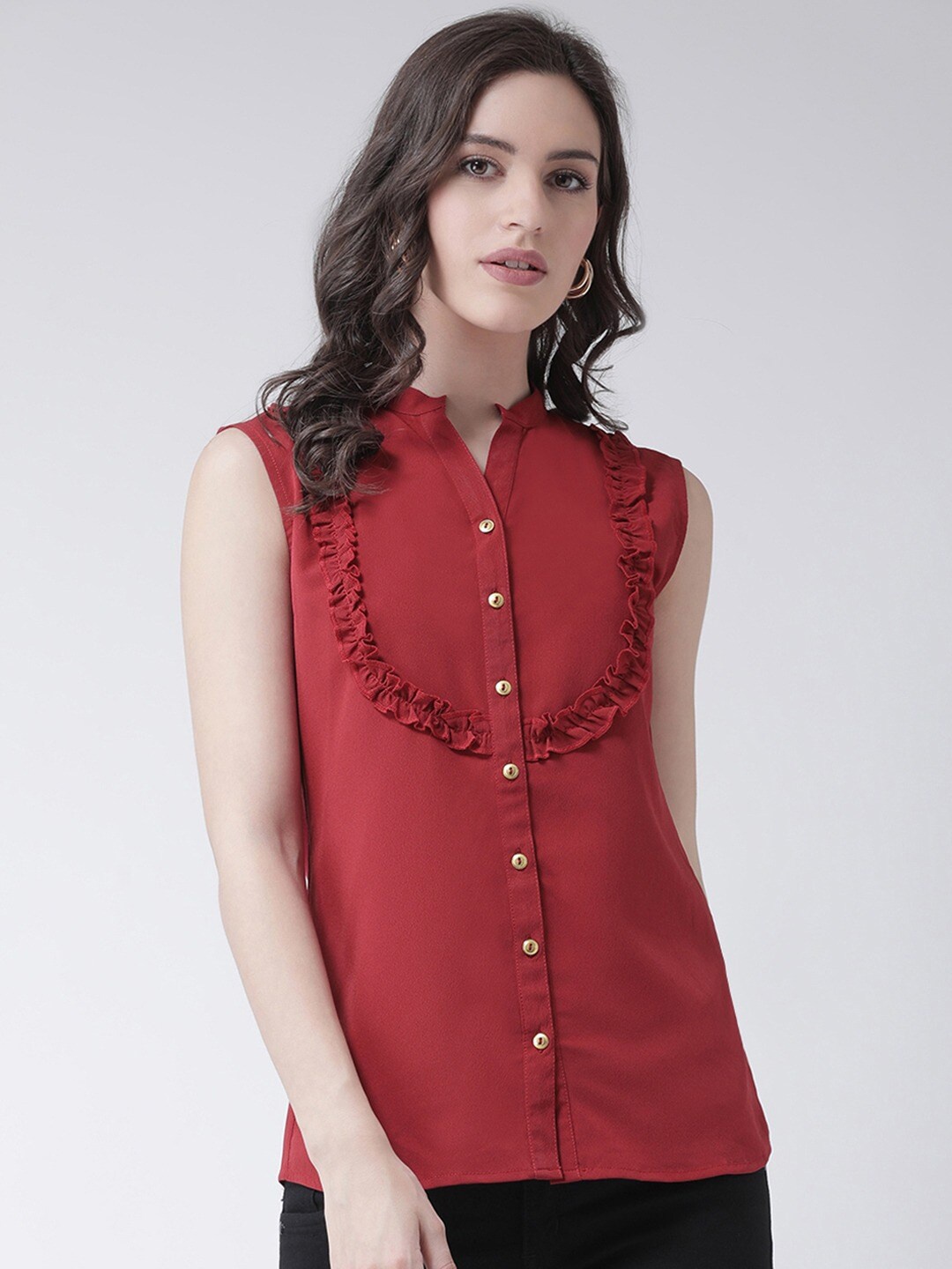 

The Vanca Women Rust Orange Ruffle Regular Fit Solid Casual Shirt