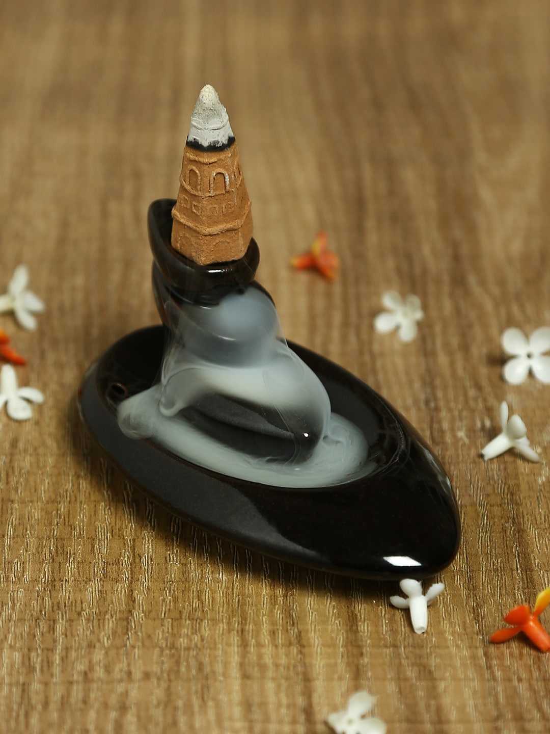 

Aapno Rajasthan Black Solid Resin Smoke Fountain with Built-In Backflow Incense Cone