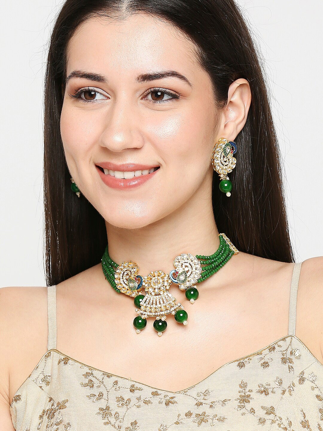 

OOMPH Gold-Toned & Green Kundan-Studded Beaded Meenakari Handcrafted Jewellery Set