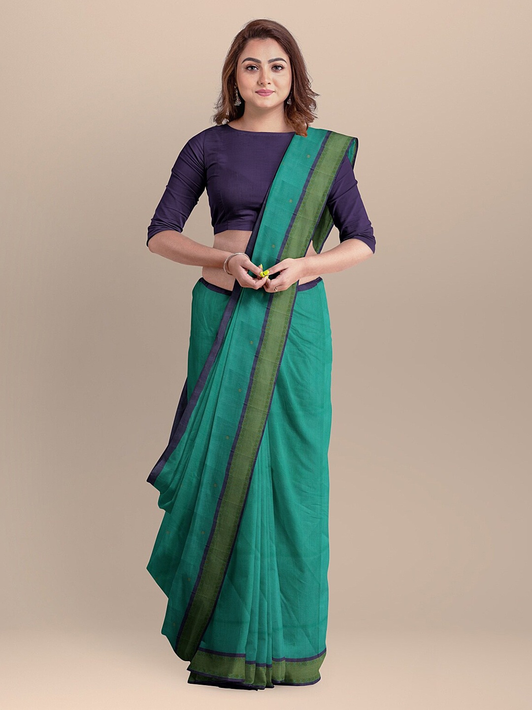 

APCO Green Woven Design Pure Cotton Saree
