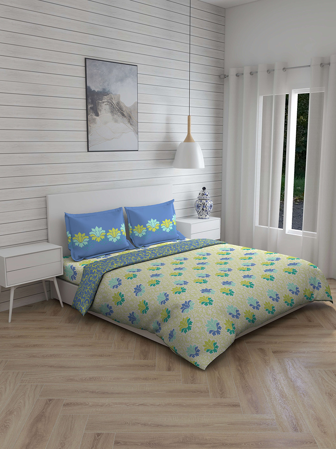 

Layers Blue & Green Floral Printed 140 TC Double Queen Bedding Set With Comforter