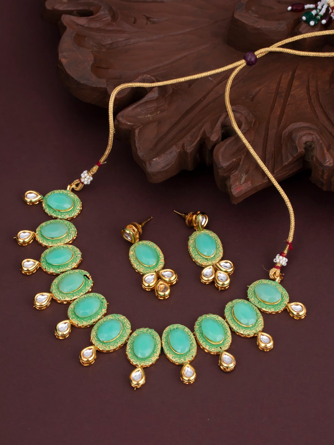 

Sukkhi Gold-Plated Turquoise Blue & Green Kundan-Studded Meenakari Jewellery Set