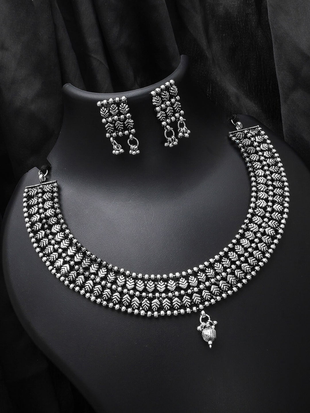 

aadita Oxidised Silver-Plated Textured Jewellery Set