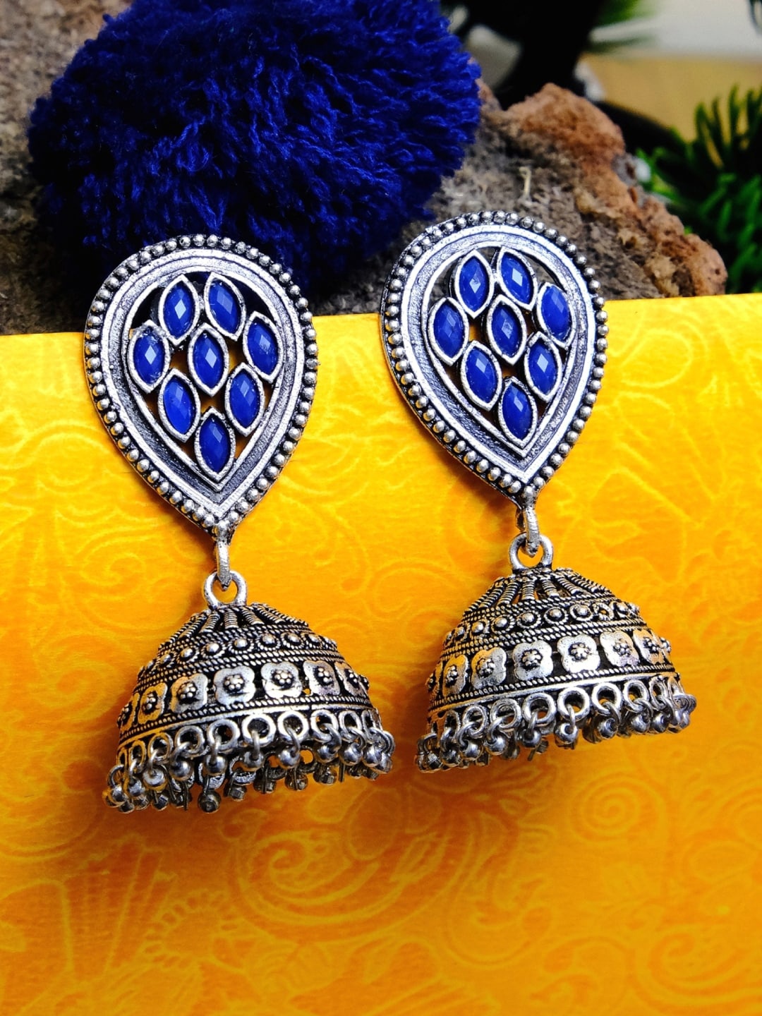 

Crunchy Fashion Oxidized Silver-Plated Blue Studded Dome Shaped Jhumkas