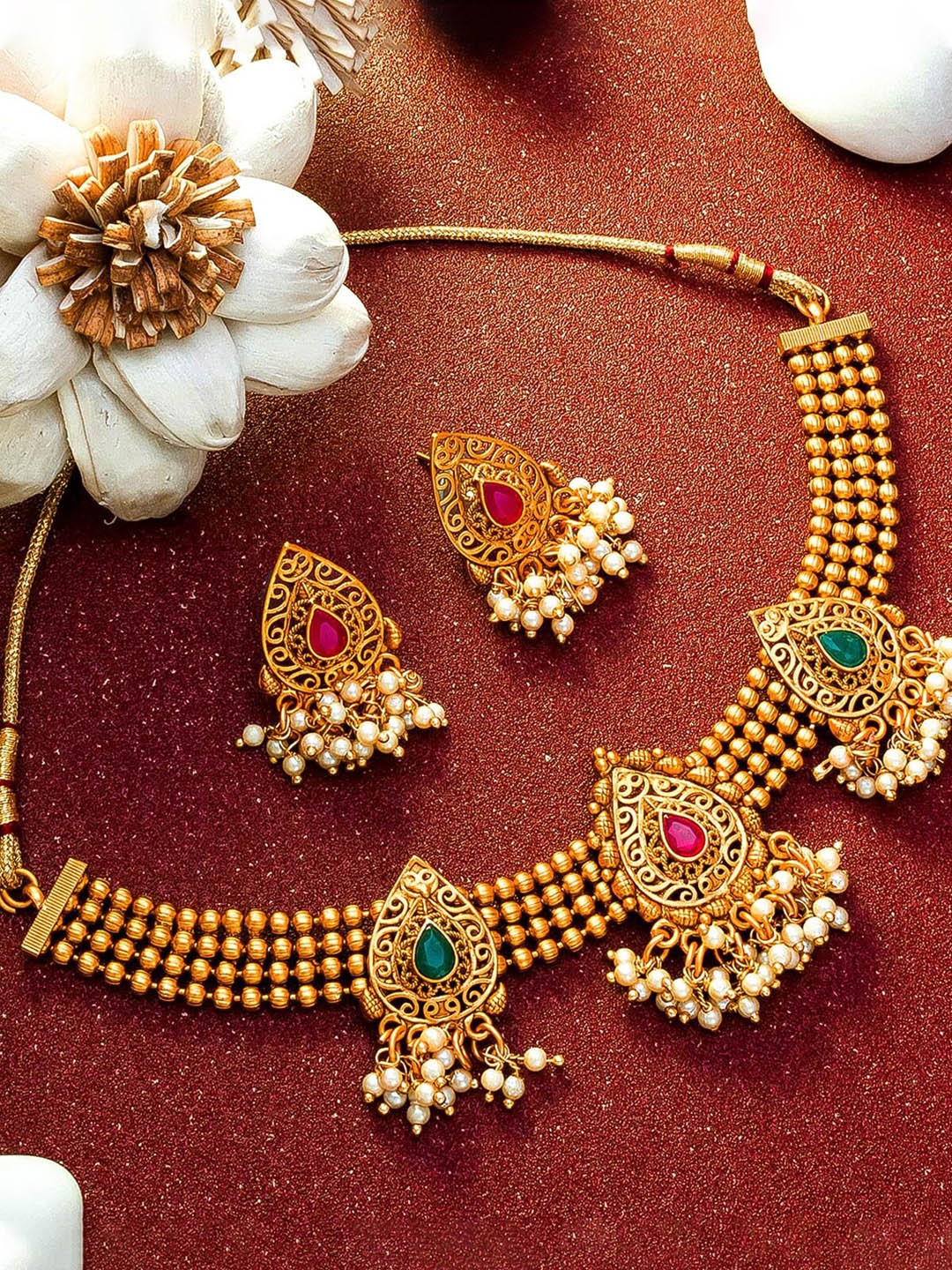 

aadita Gold-Plated Green & Pink Stone-Studded Beaded Choker Jewellery Set