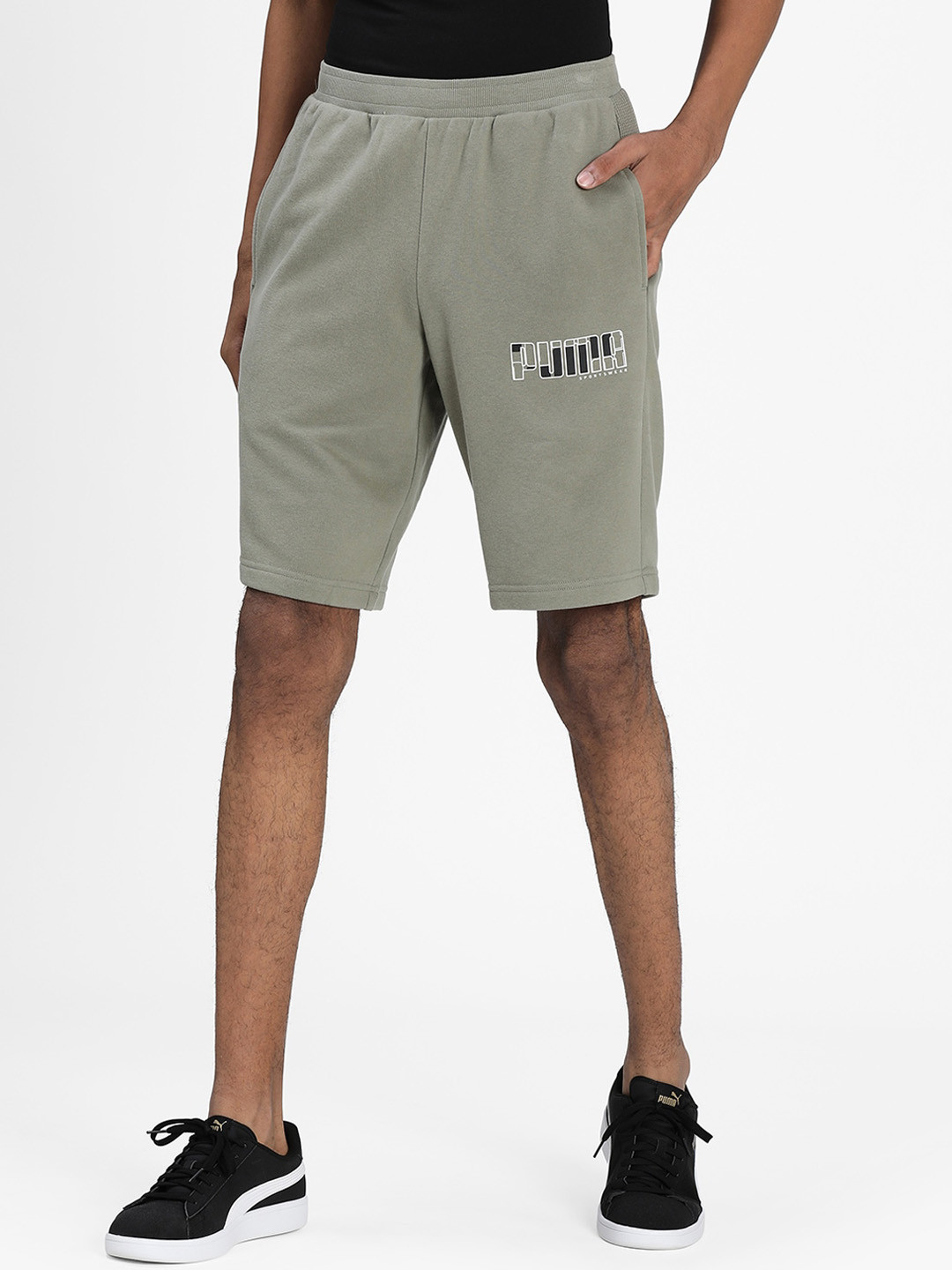 

Puma Men Olive Green Solid Regular Fit Cotton Sports Shorts