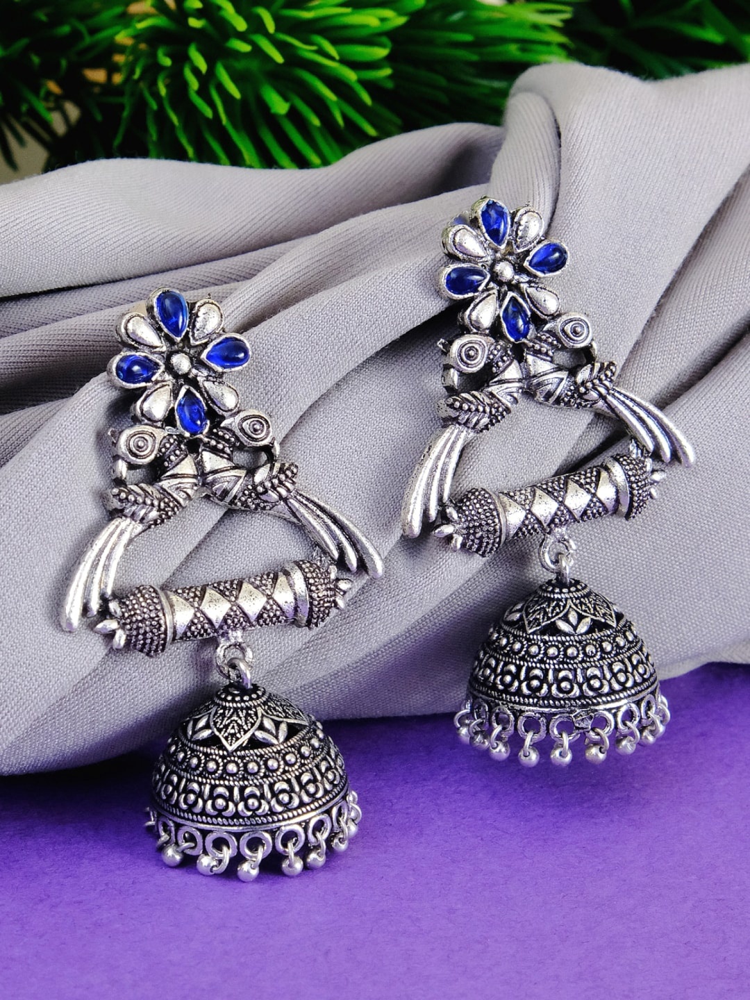 

Crunchy Fashion Oxidized Silver-Plated Blue Studded Dome Shaped Jhumkas