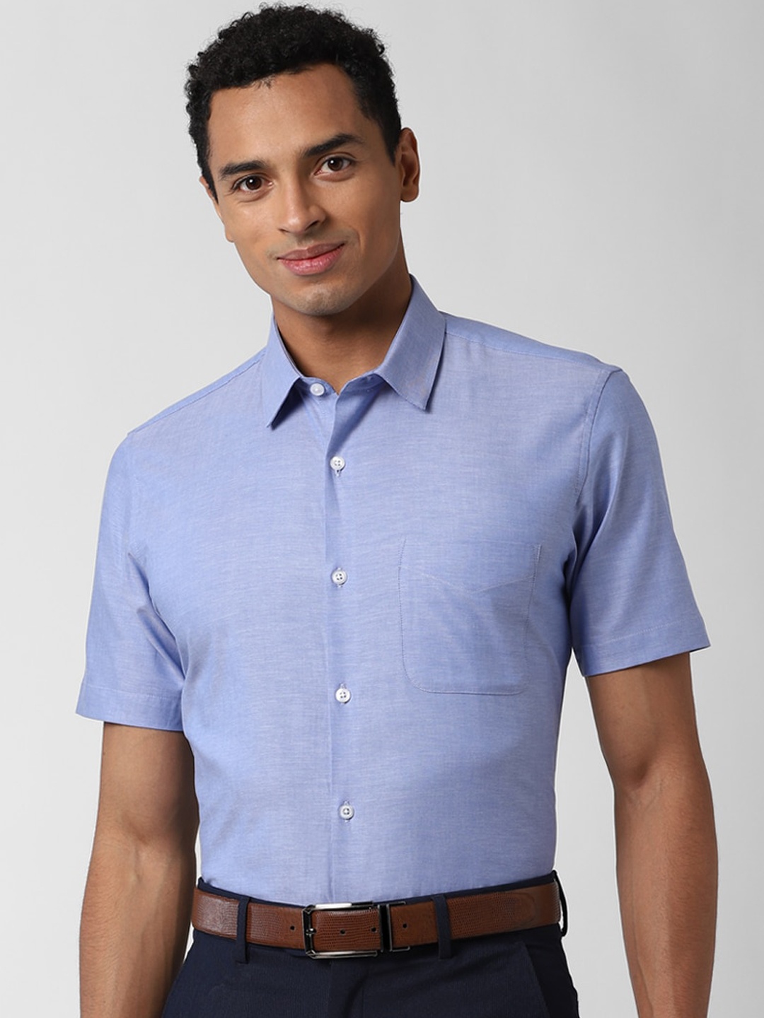 

Peter England Men Blue Slim Fit Solid Pure Cotton Semiformal Shirt