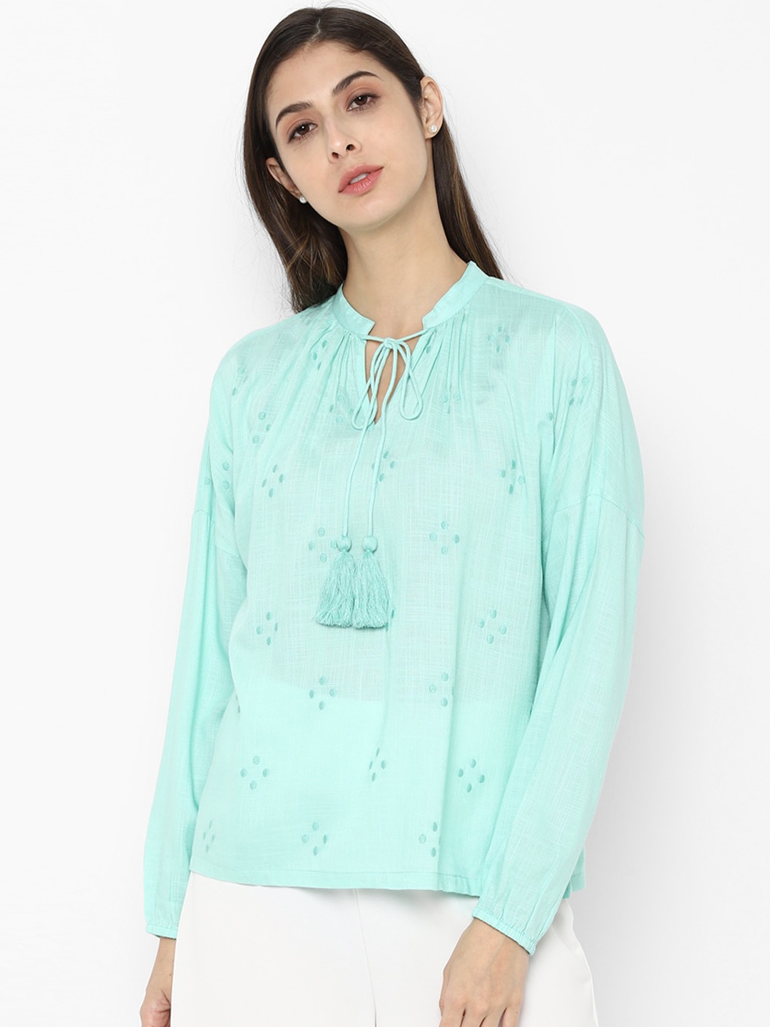

Allen Solly Woman Blue Embroidered Tie-Up Neck Regular Top