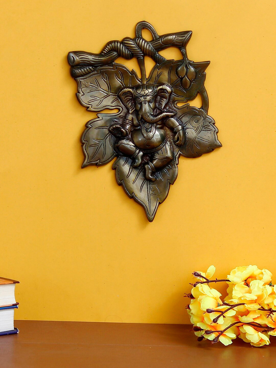 

eCraftIndia Brown Antique Finish Lord Ganesha On Creative Leaf Handcrafted Metal Wall Hanging